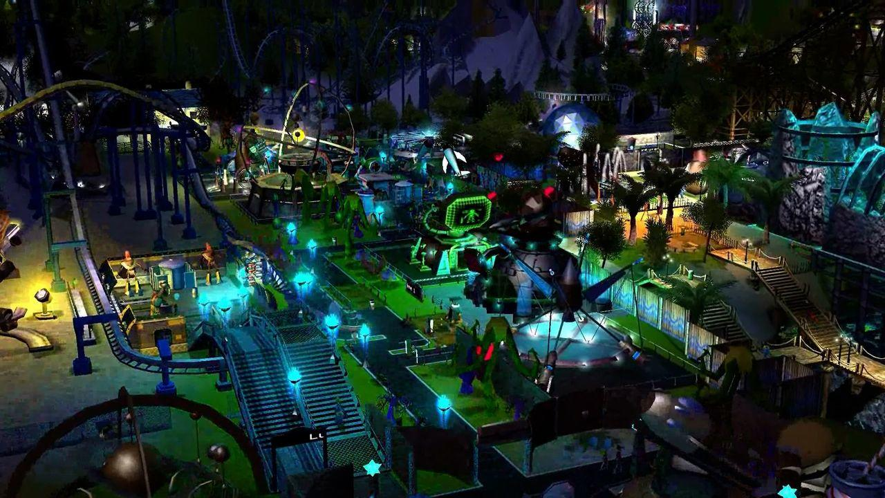 Ein Freizeitpark bei Nacht mit Achterbahnen und Lichtern.