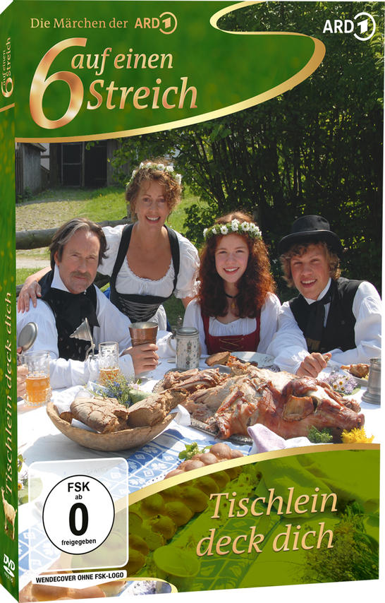 Vier Personen in Tracht sitzen an einem Tisch mit einem Festmahl. Oben: DVD-Titel.
