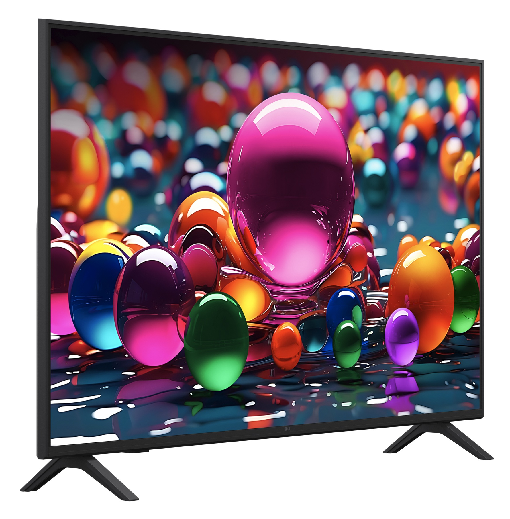 Telewizor wyświetla kolorową scenę sztuki cyfrowej z unoszącymi się kulami.