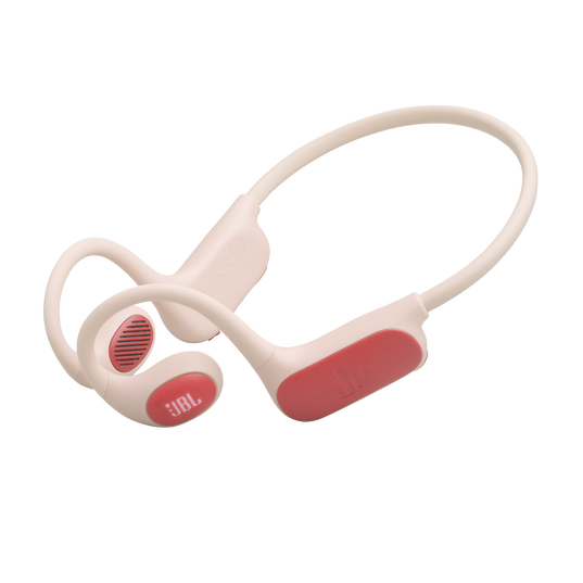 Para różowych i czerwonych słuchawek przewodnictwa kostnego JBL na czarnym tle.