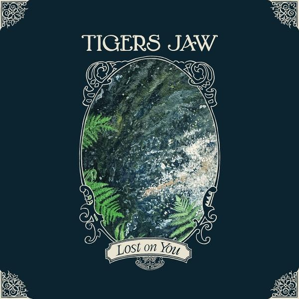 Albumcover mit Felsen, Farnen und Text "Tigers Jaw Lost on You".