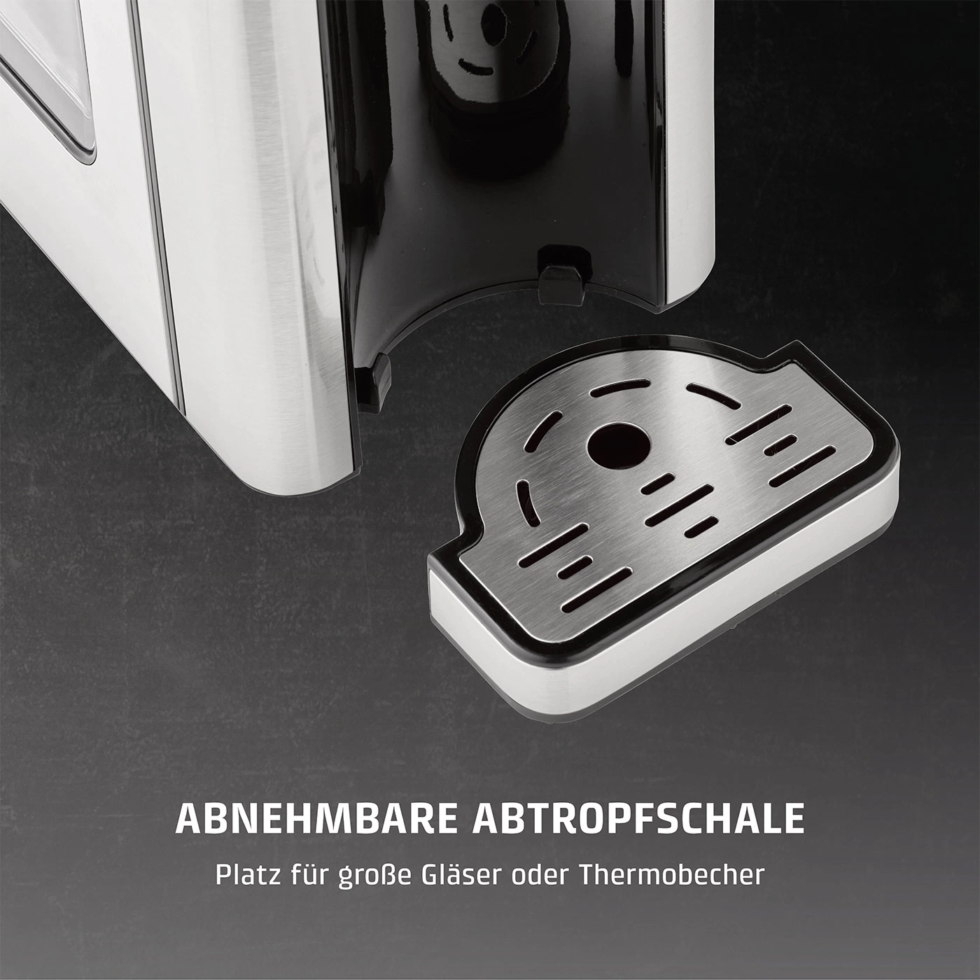 Abnehmbare Abtropfschale aus Metall mit Schlitzen, daneben Kaffeemaschine.