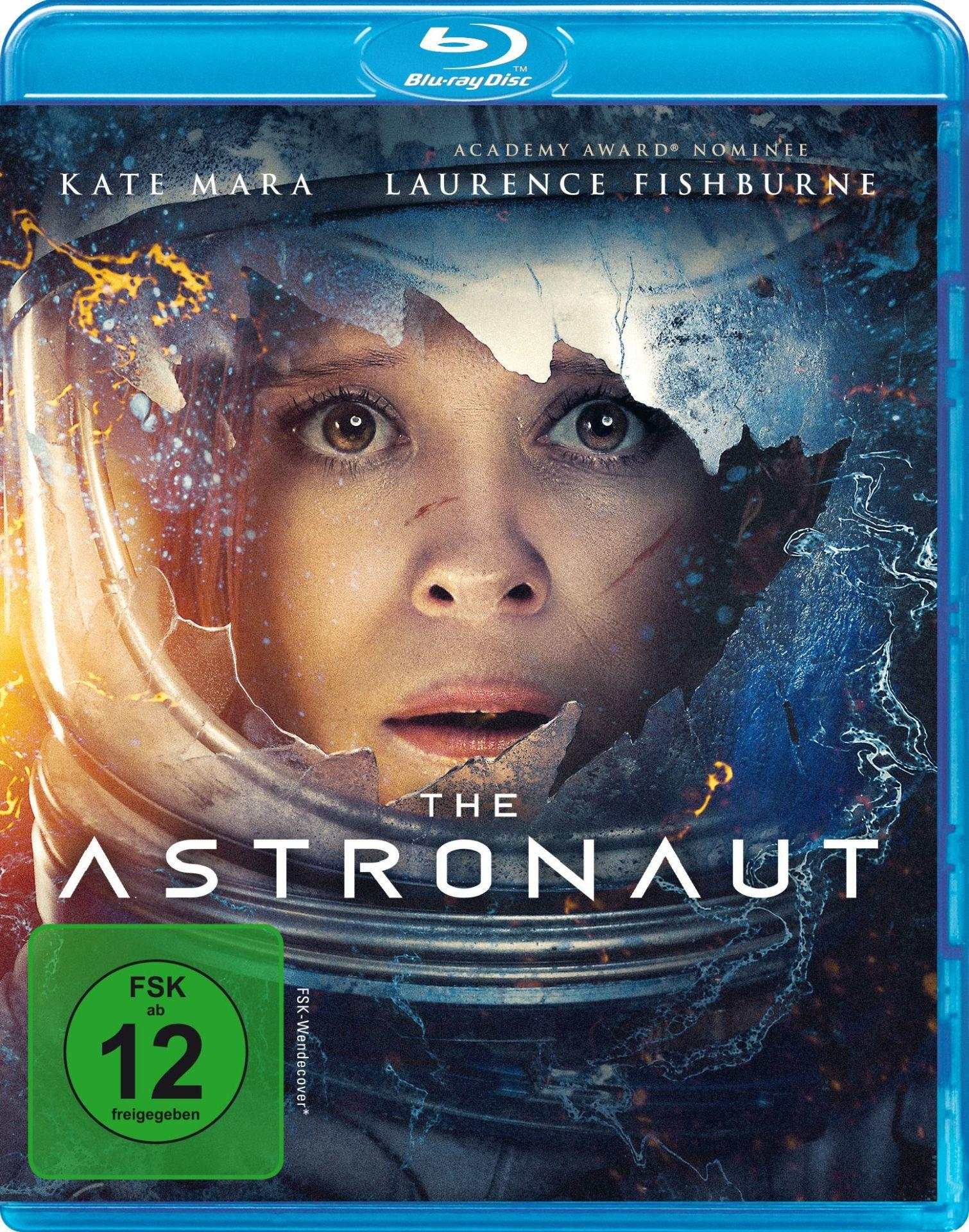 Nahaufnahme einer Astronautin im Helm, die durch zerbrochenes Glas blickt. FSK 12.