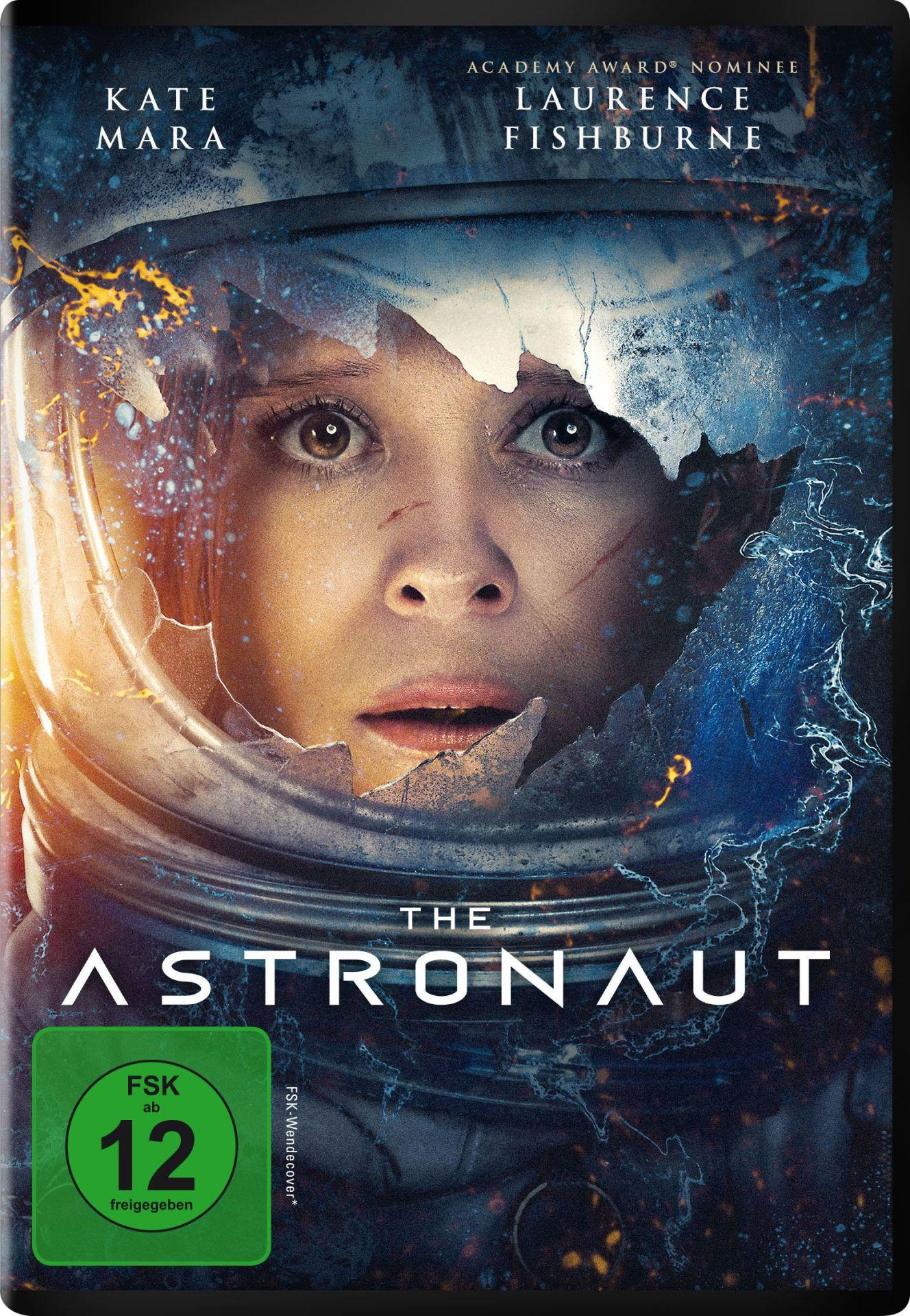 Eine Astronautin schaut durch ein zerbrochenes Visier mit Weltraumstaub.