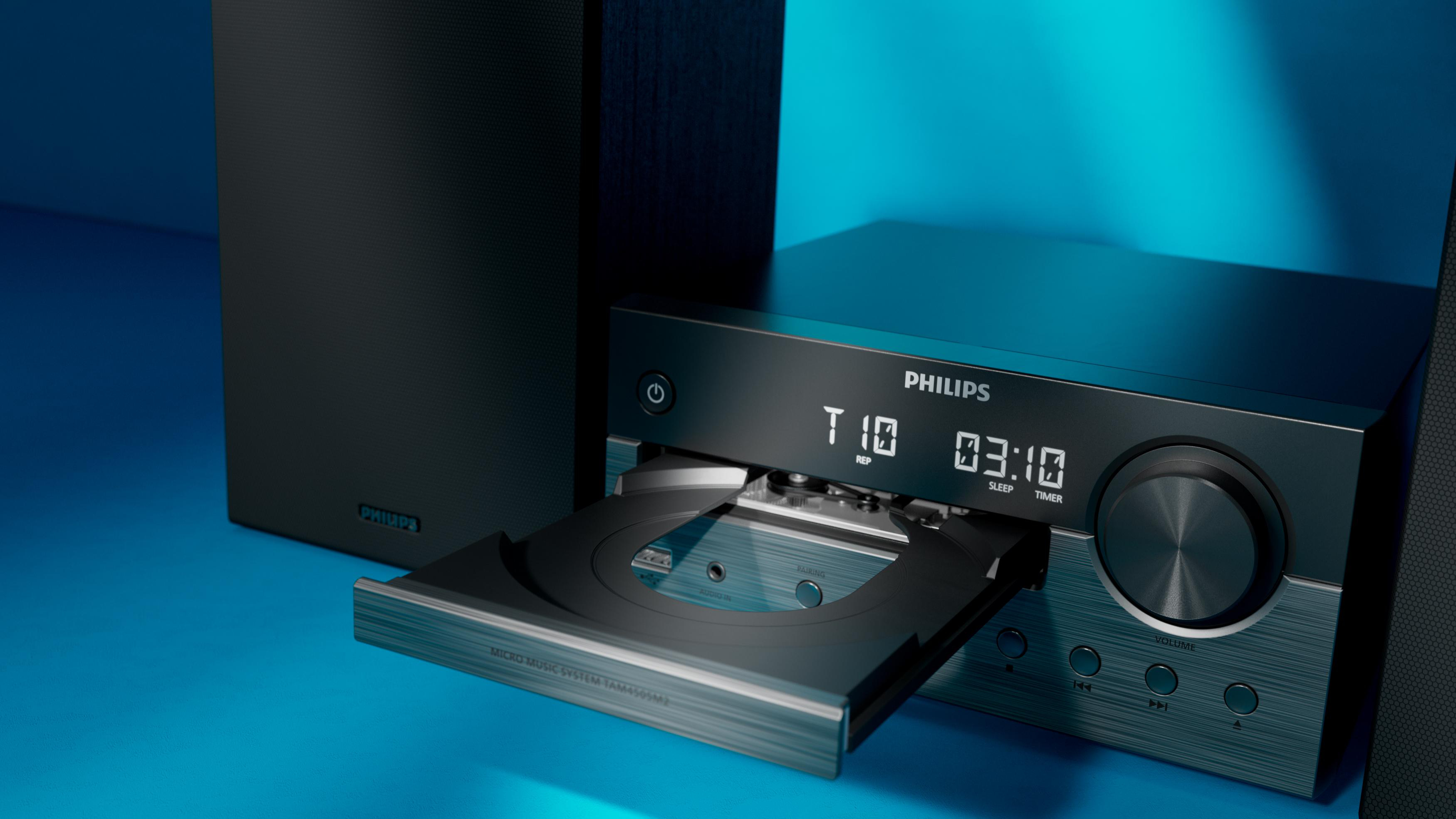 Philips Musikanlage mit CD-Schublade offen, blaue Hintergrundbeleuchtung.