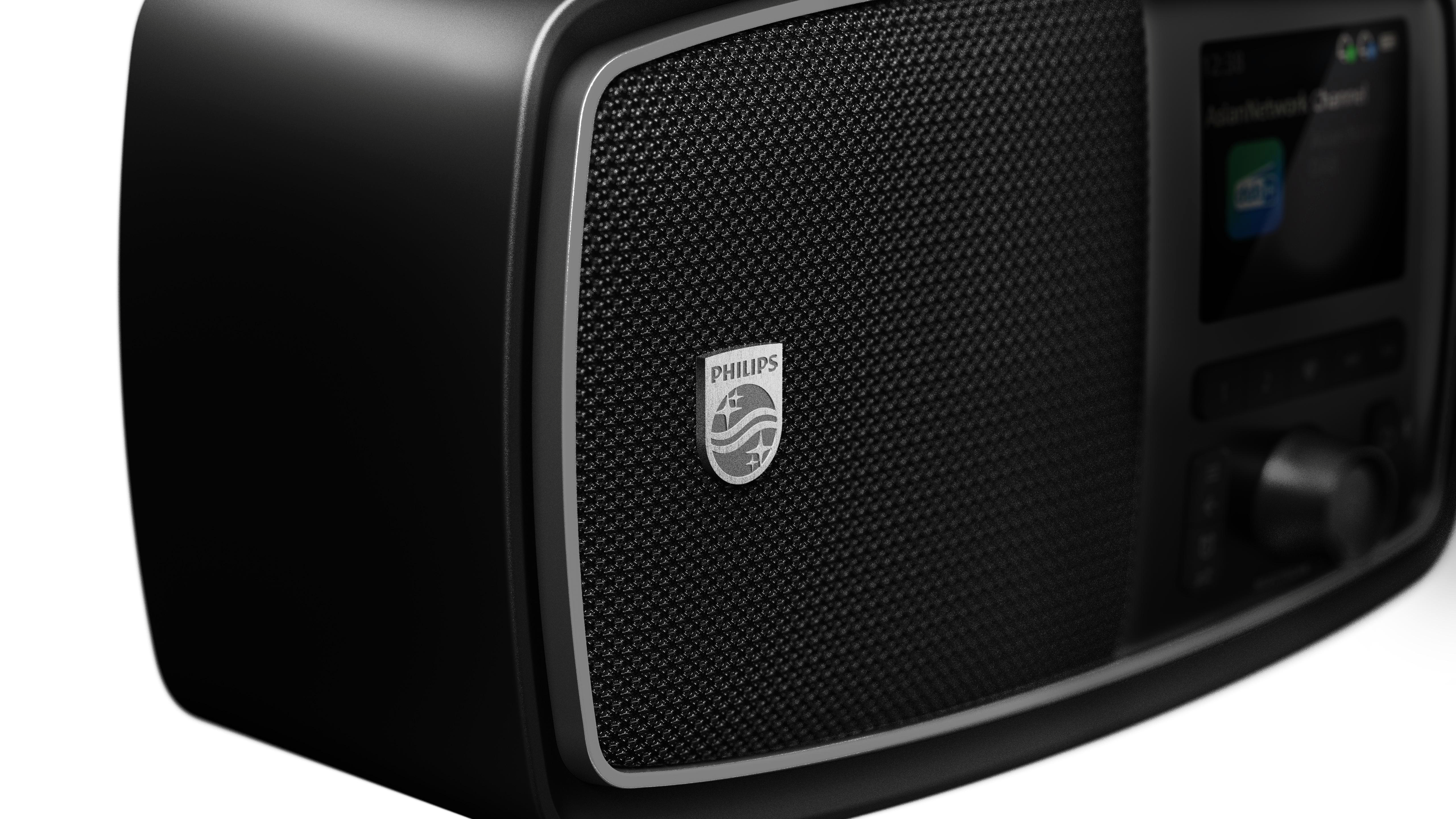Schwarzer Philips Lautsprecher mit Gitter und kleinem Bildschirm.