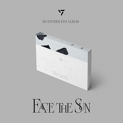 Un coffret d'album blanc intitulé "Face the Sun" avec le logo SEVENTEEN.