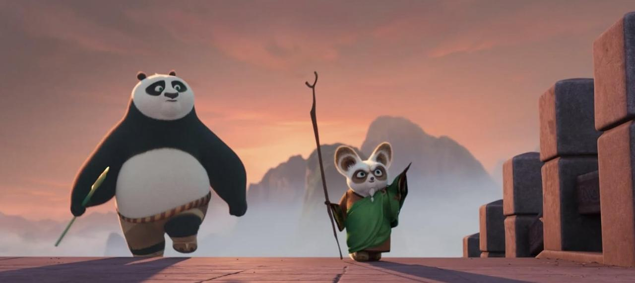 Ein Panda und ein kleiner Meister gehen über eine Brücke bei Sonnenuntergang.