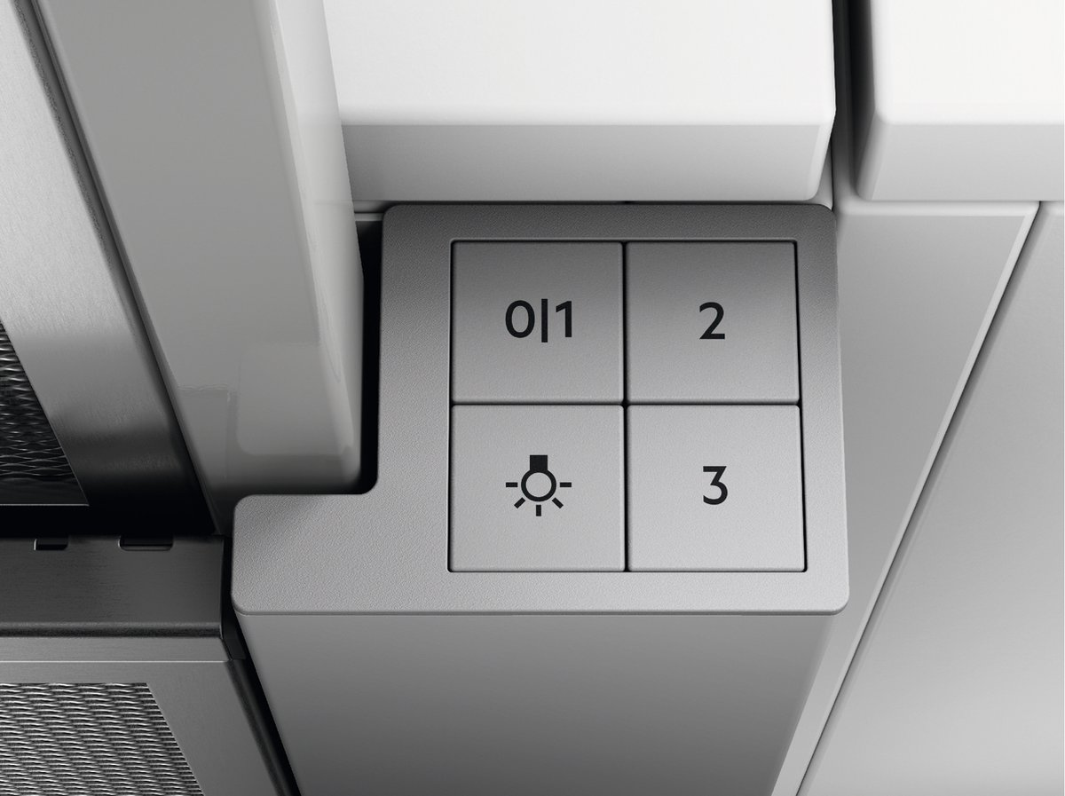 Close-up of a range hood control panel with four buttons.