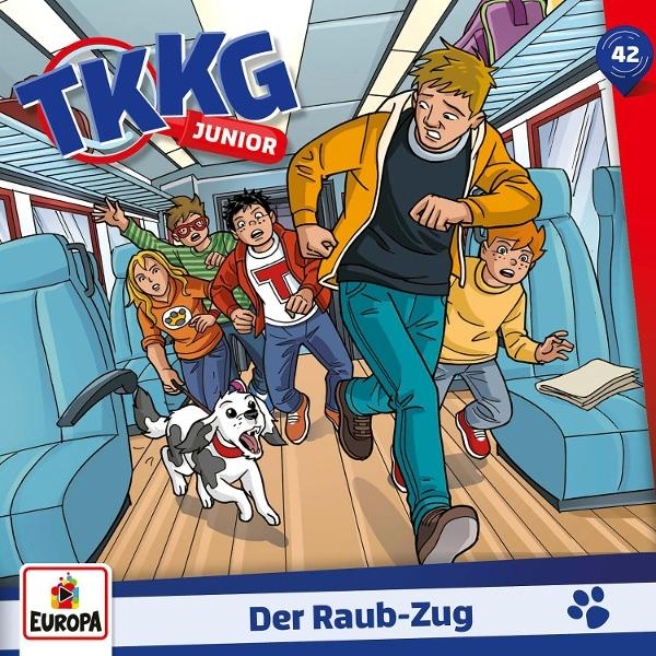Fünf Kinder und ein Hund rennen durch einen Zugwaggon, um einen Dieb zu fangen.