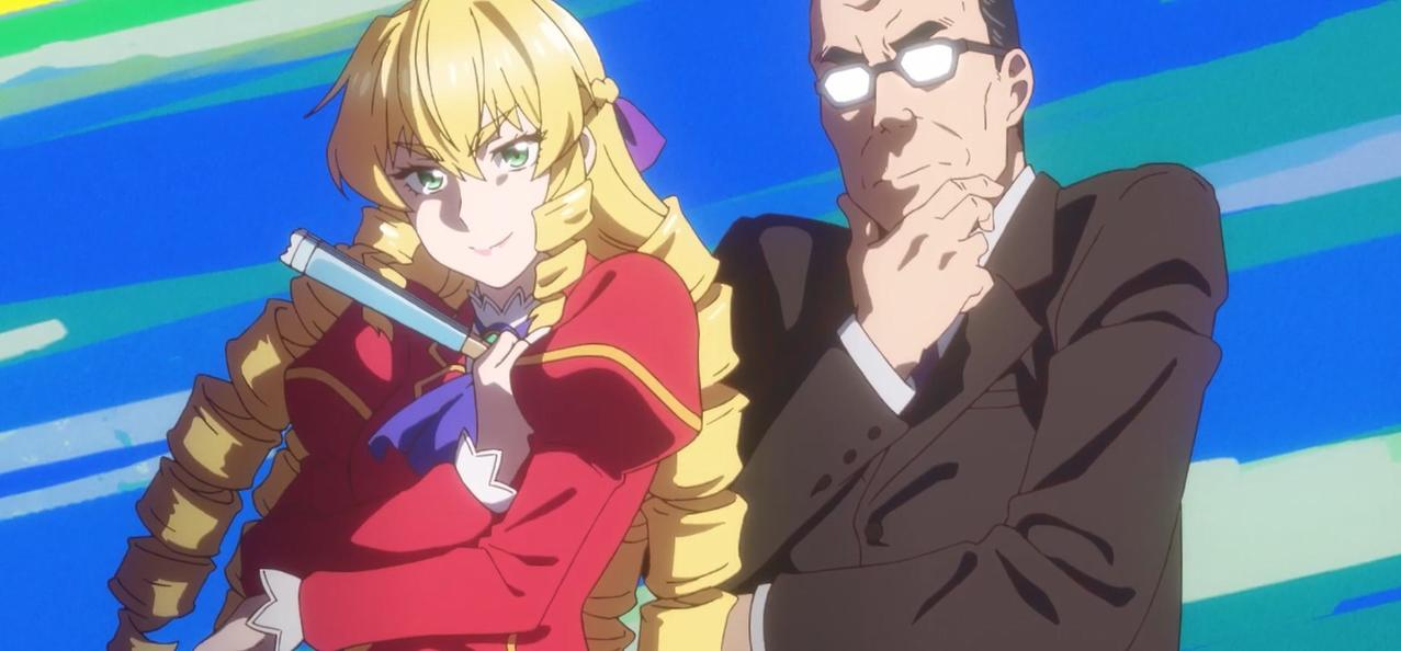Eine Frau mit blonden Locken und ein Mann im Anzug stehen nebeneinander.