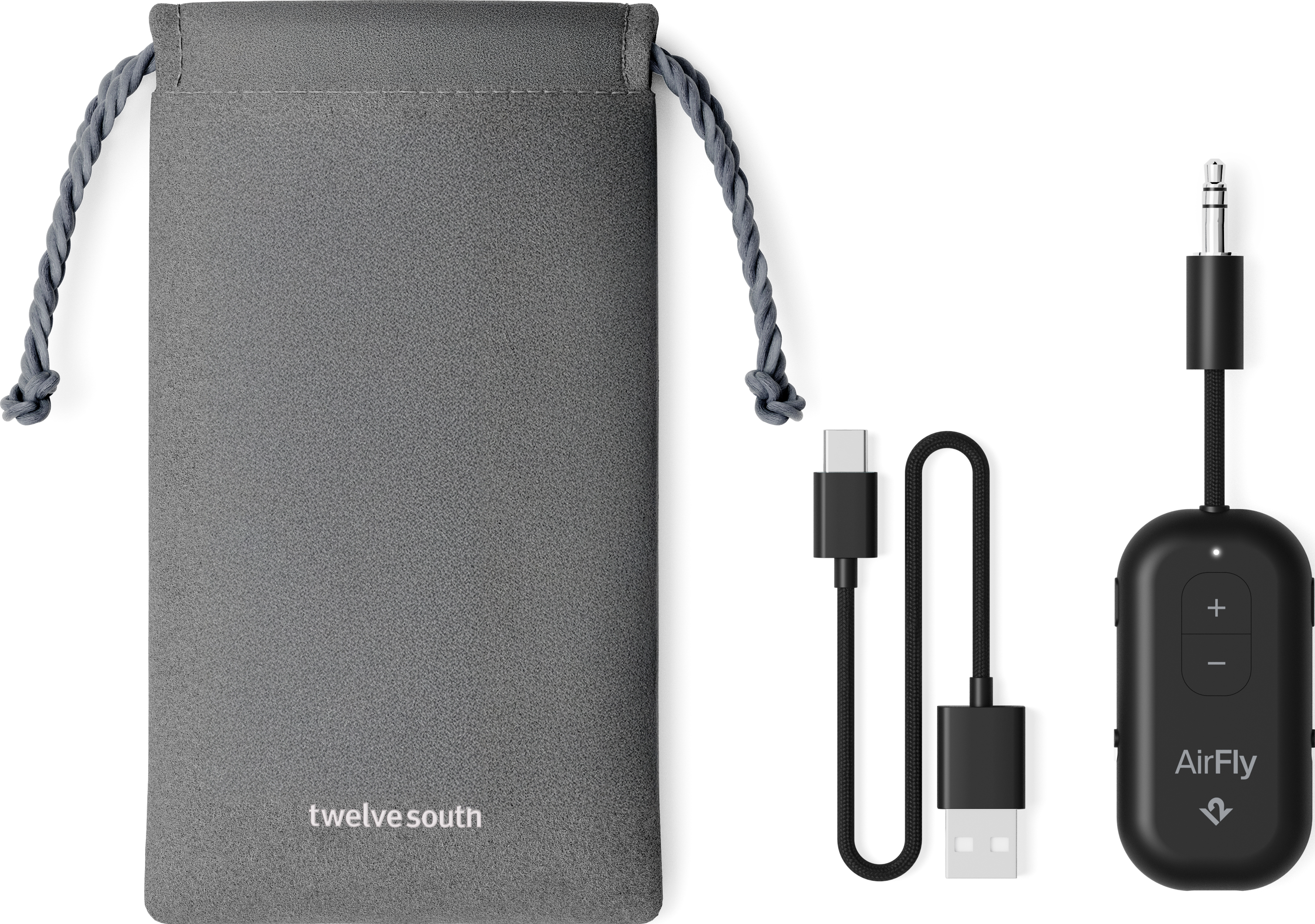Pochette grise, câble USB-C vers USB-A et adaptateur AirFly noir avec prise jack 3,5 mm.