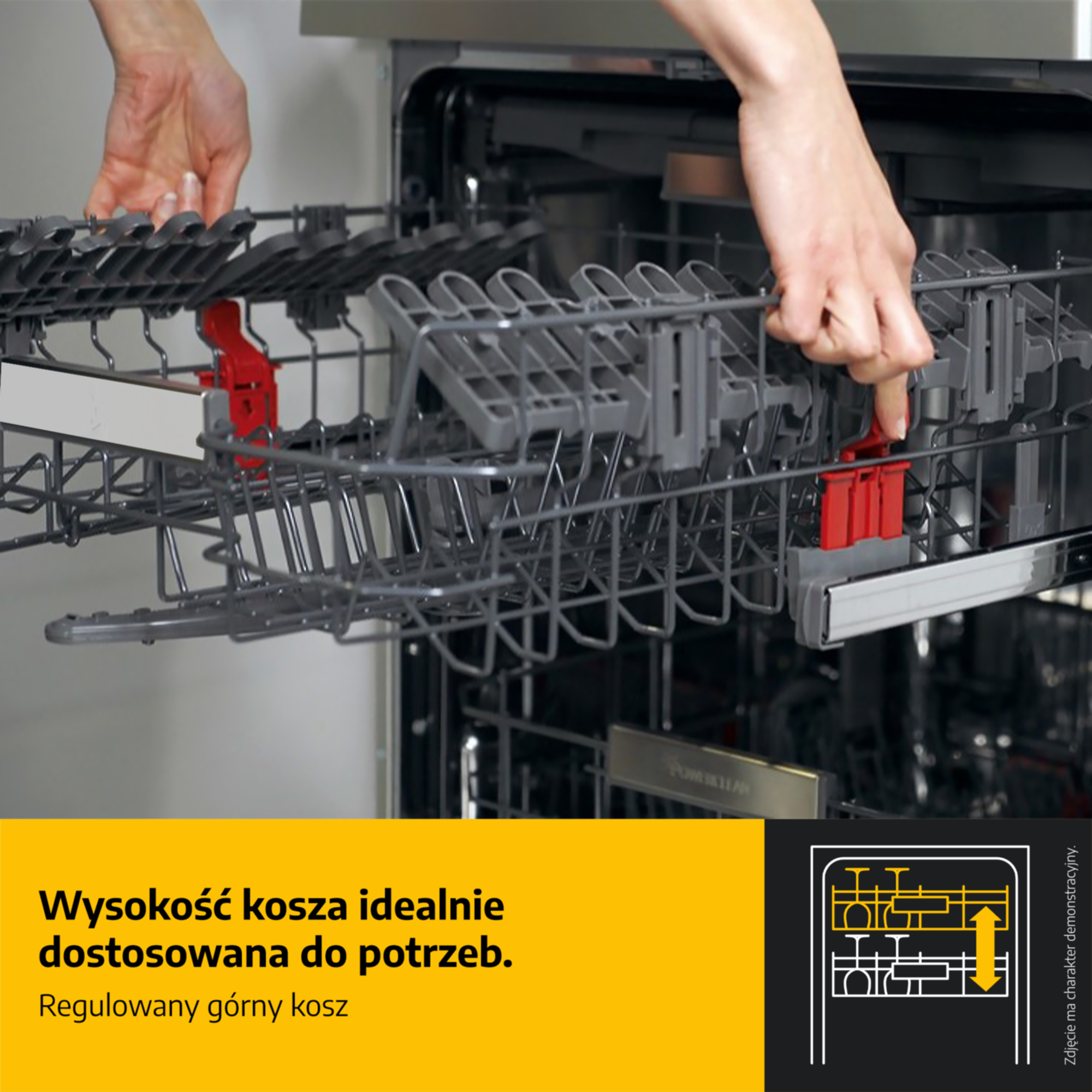 Ręce regulują górny kosz zmywarki. Szary kosz z czerwonymi dźwigniami.