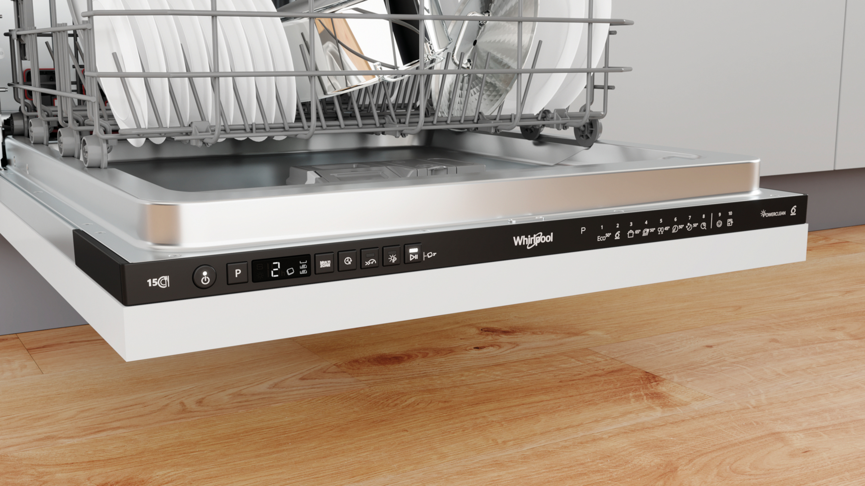Zmywarka z załadowanym górnym koszem, panelem sterowania i drewnianą podłogą.