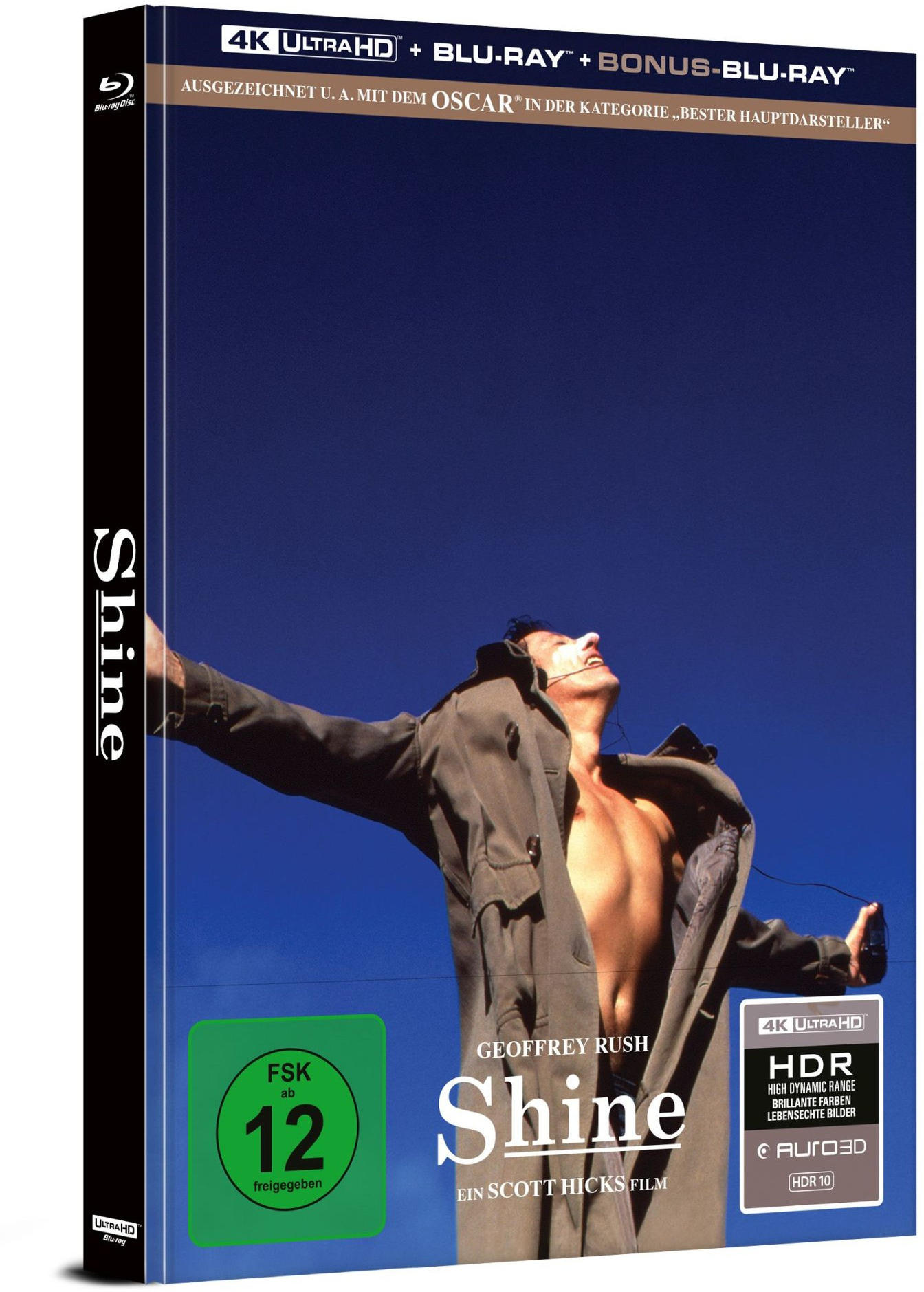 Mann in Jacke gegen blauen Himmel, Filmplakat für 'Shine'.