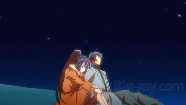 Zwei Anime-Figuren sitzen unter einem Sternenhimmel.