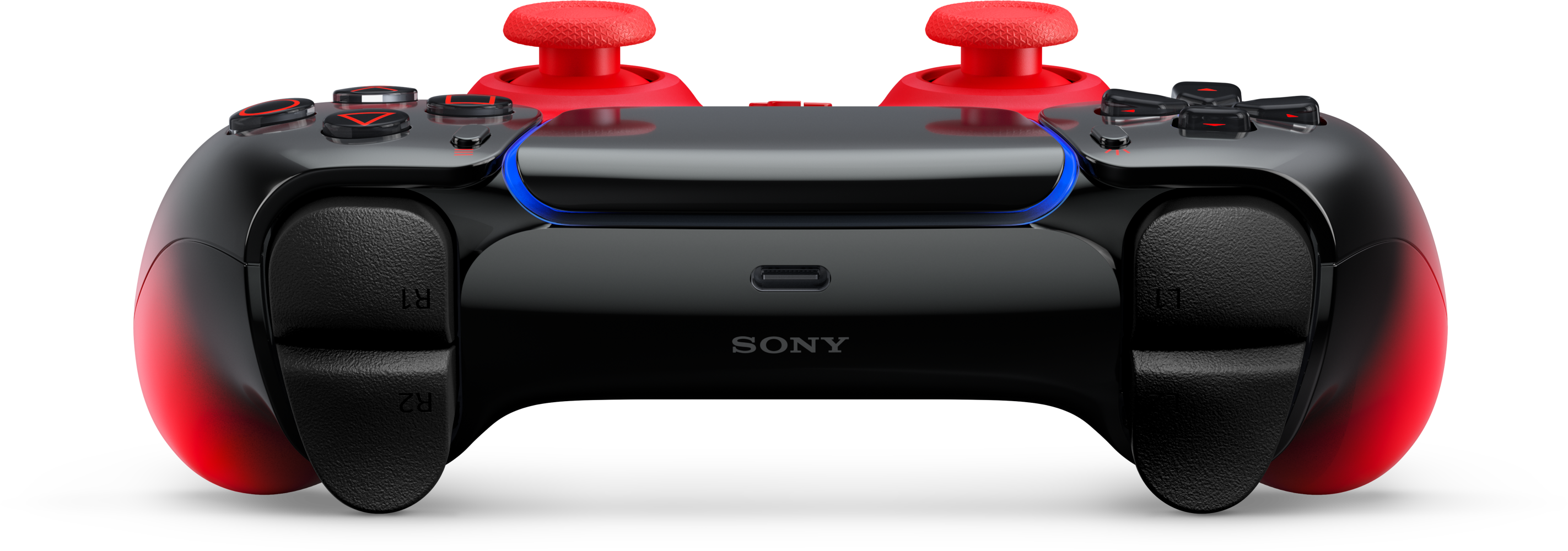 Fekete kontroller piros joystickokkal és kék fénnyel, Sony logó.