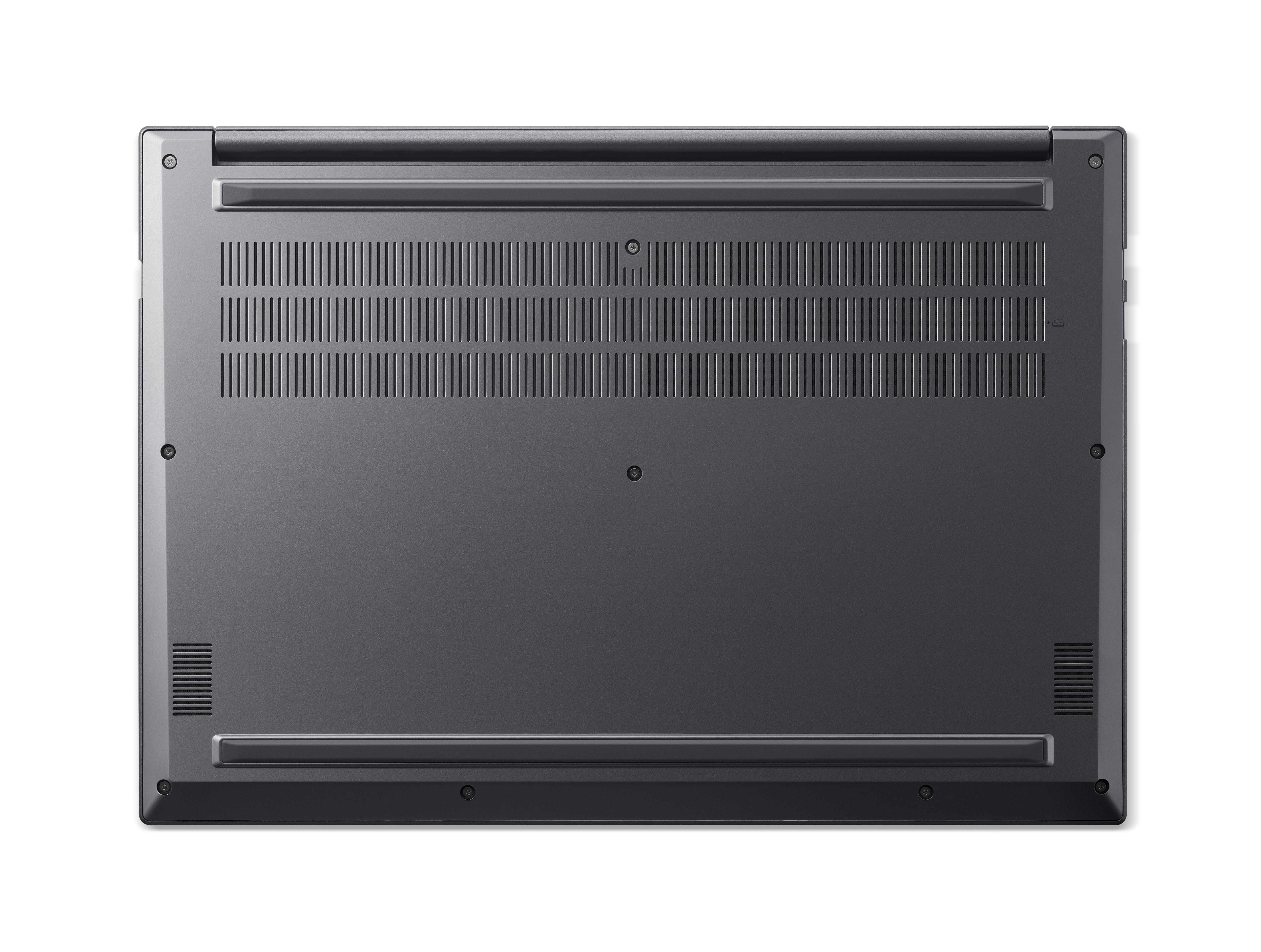 Unterseite eines dunklen Laptops mit Lüftungsschlitzen und Schrauben.