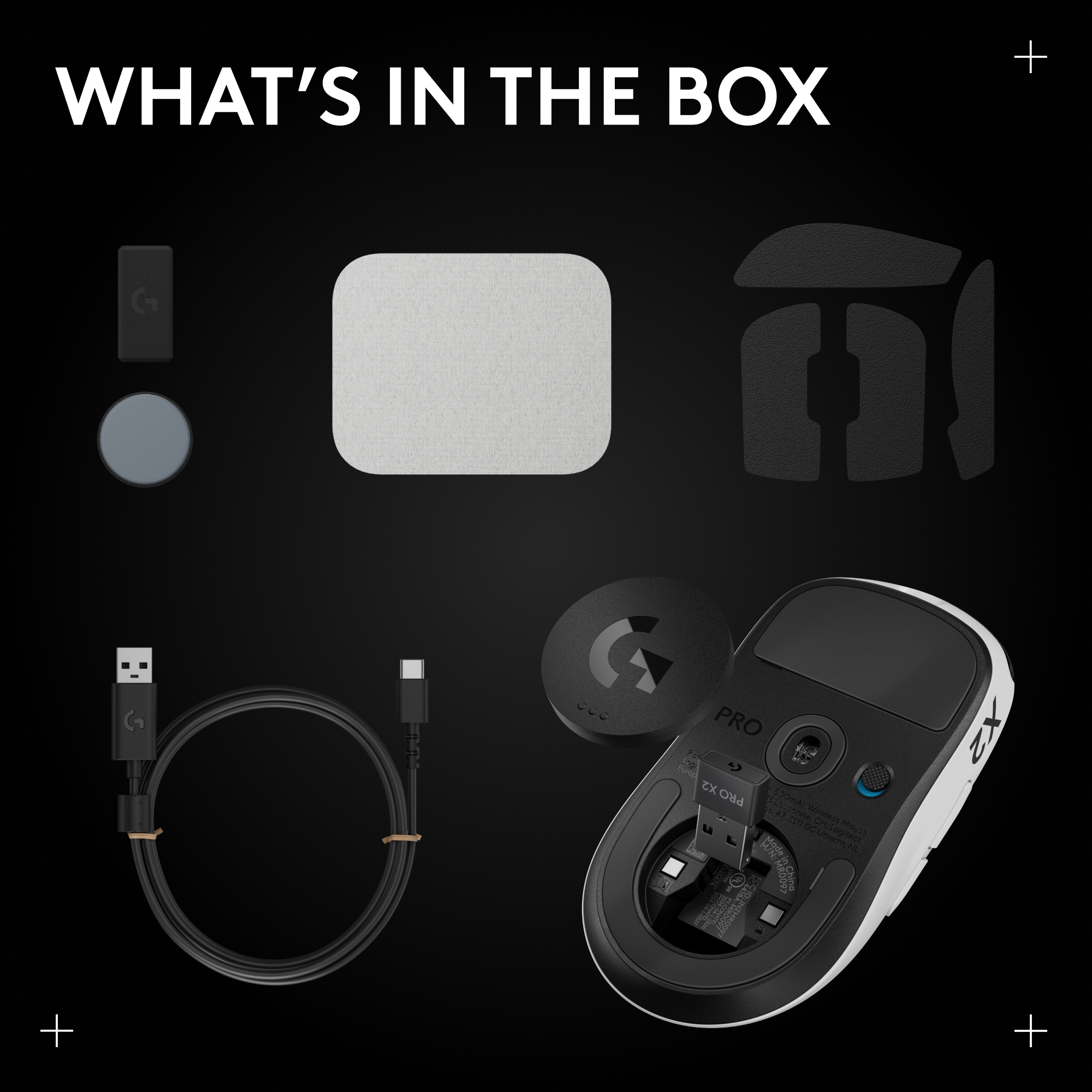 Accessoires de souris Logitech Pro X2 : câble USB, dongle, ruban adhésif et souris.
