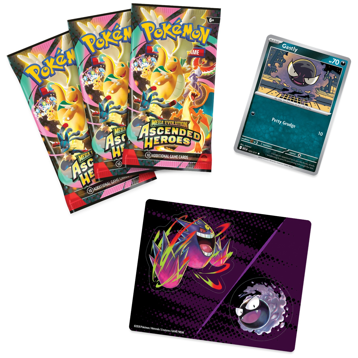 Packs de cartes Pokémon, une carte Gastly et un tapis de jeu sur le thème Pokémon.