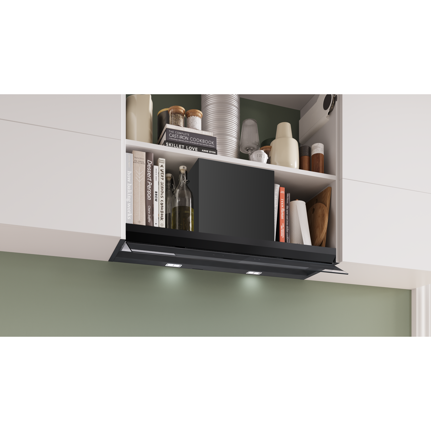 Kitchen cabinet with books, jars, and a black range hood.