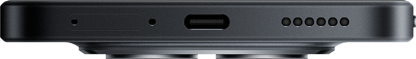 Egy fekete okostelefon alsó részének közelképe USB-C porttal.