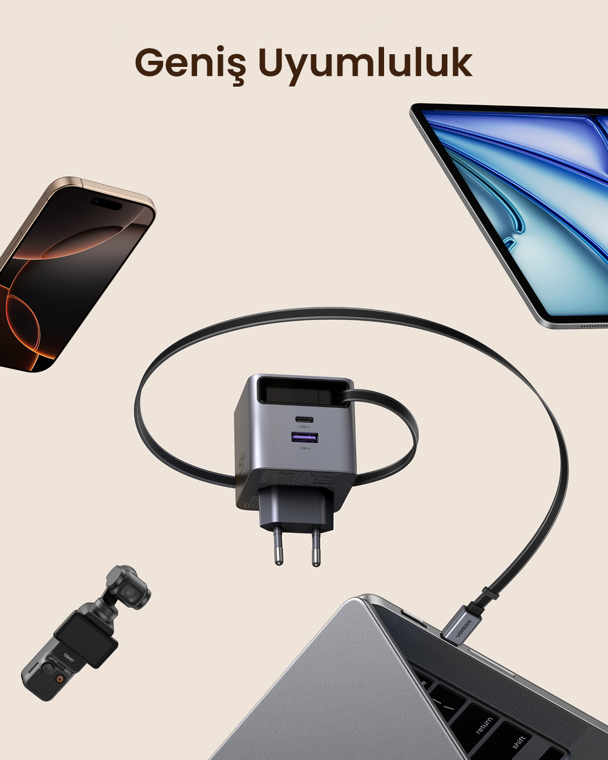 Bir şarj cihazı, telefon, dizüstü bilgisayar, tablet ve kamera.