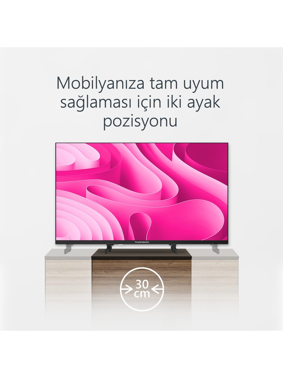 Thomson TV, 30 cm ikonlu ahşap mobilya üzerinde.