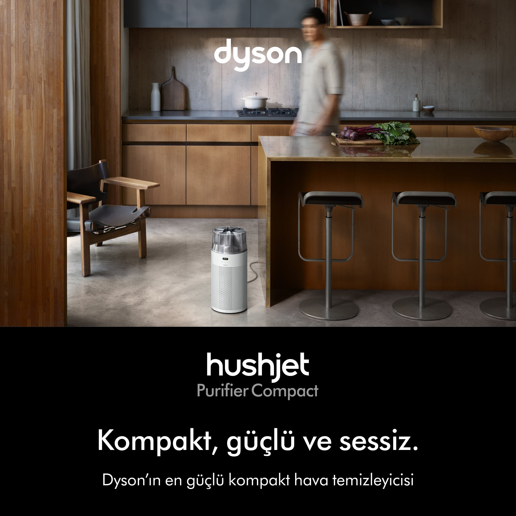 Dyson hava temizleyici, bar tabureli modern bir mutfakta.