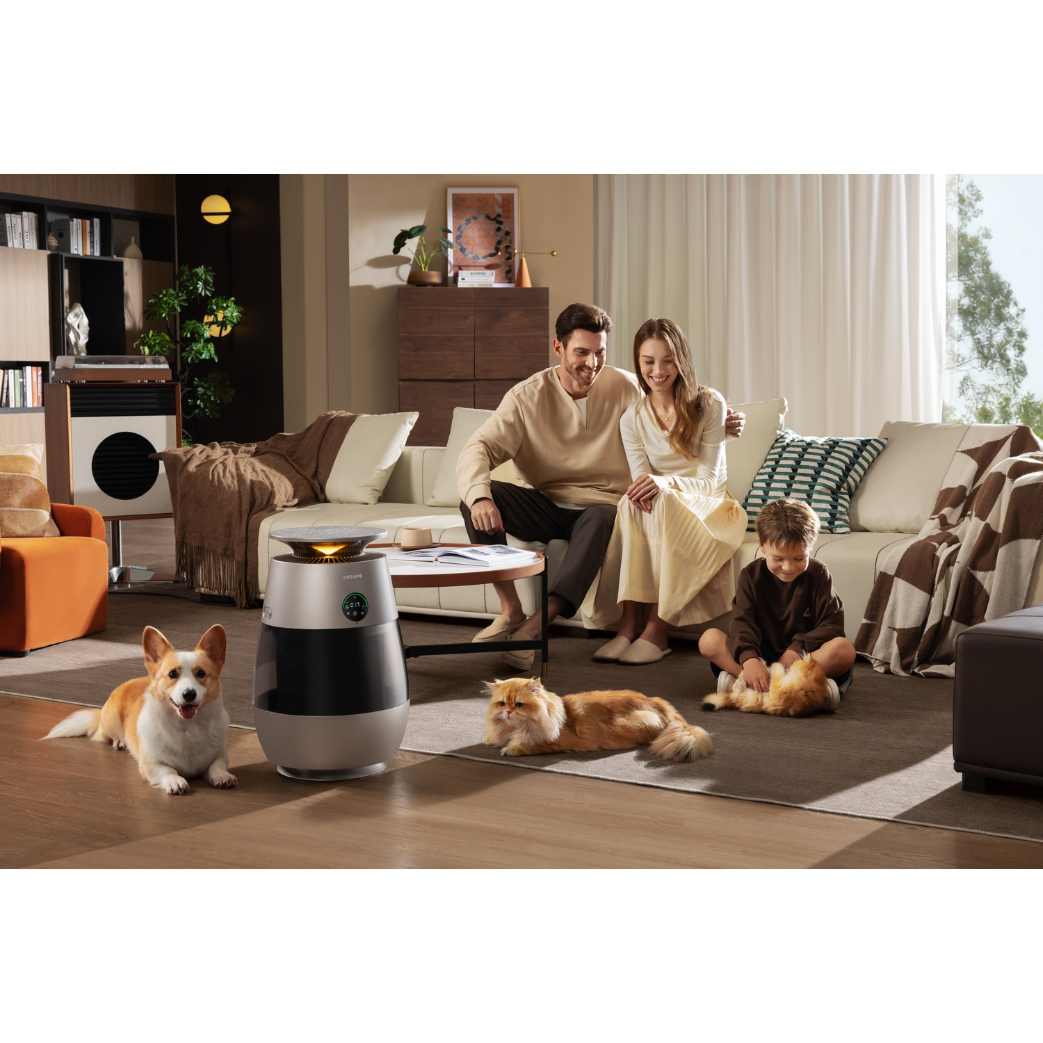Family with dog and cat in living room, air purifier in foreground.