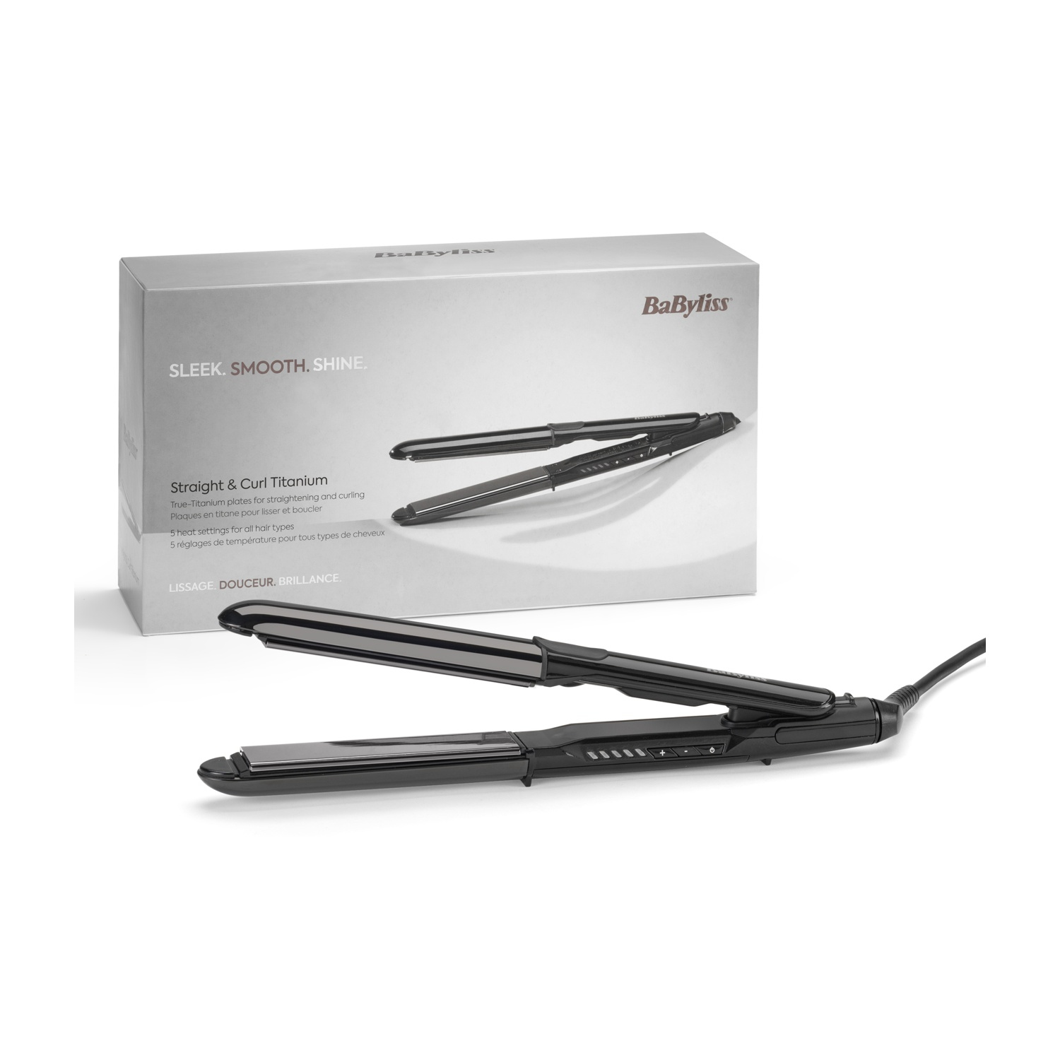 Una piastra per capelli BaByliss nera con piastre in titanio giace accanto alla scatola.