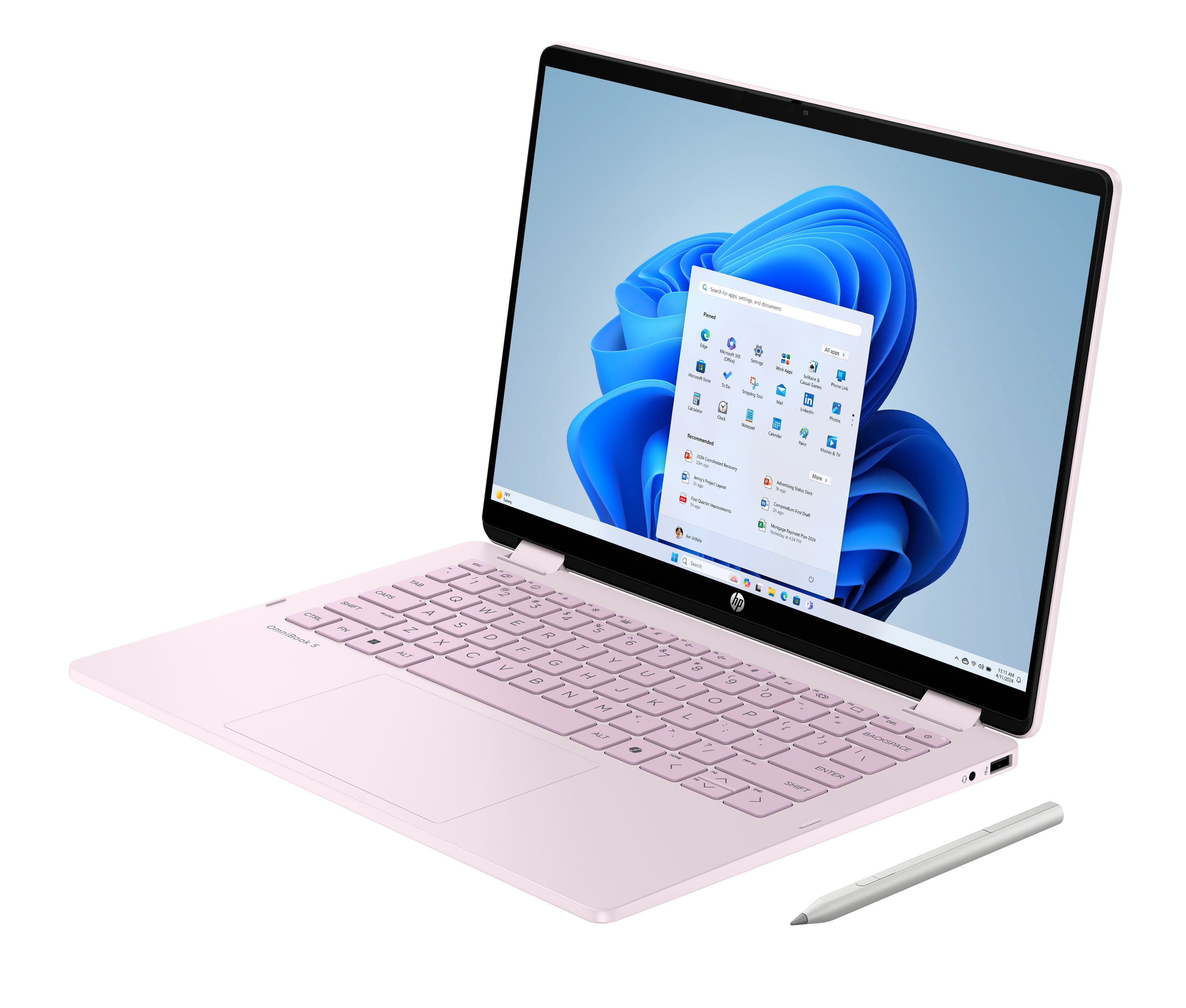Un ordinateur portable rose avec un stylet à côté.