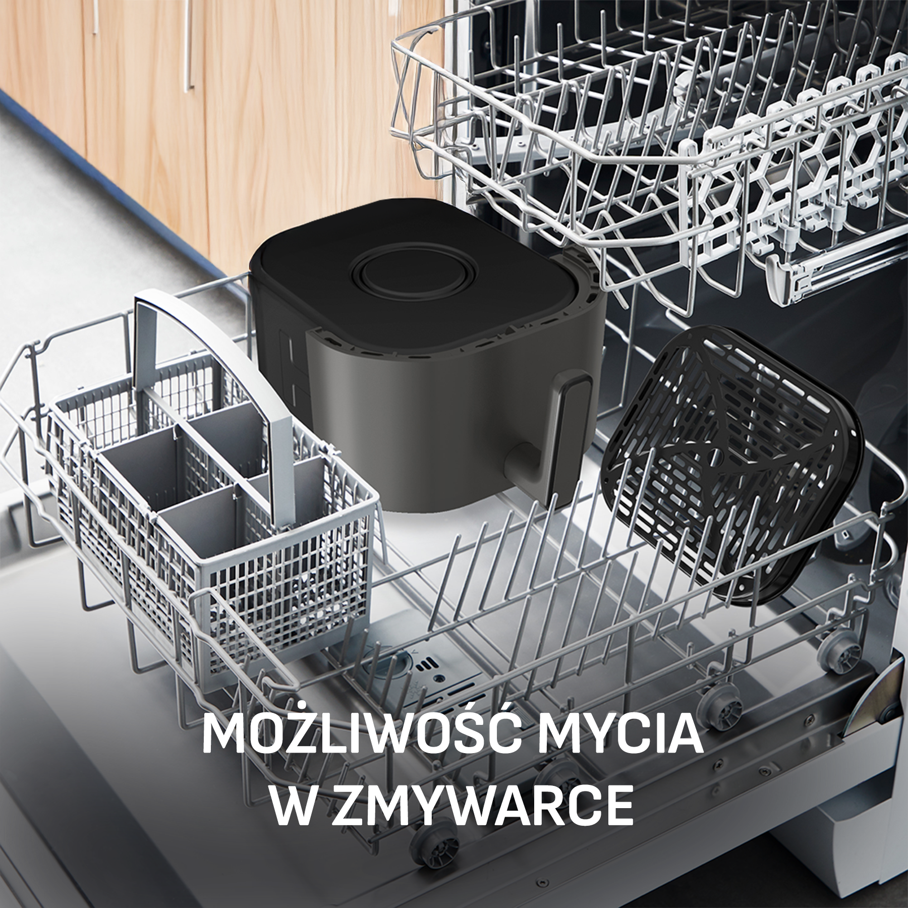 Czarny frytkownica beztłuszczowa i kosz w otwartej zmywarce.