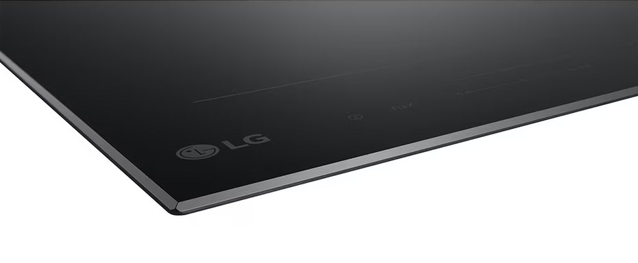 Fekete LG indukciós főzőlap ezüst kerettel.