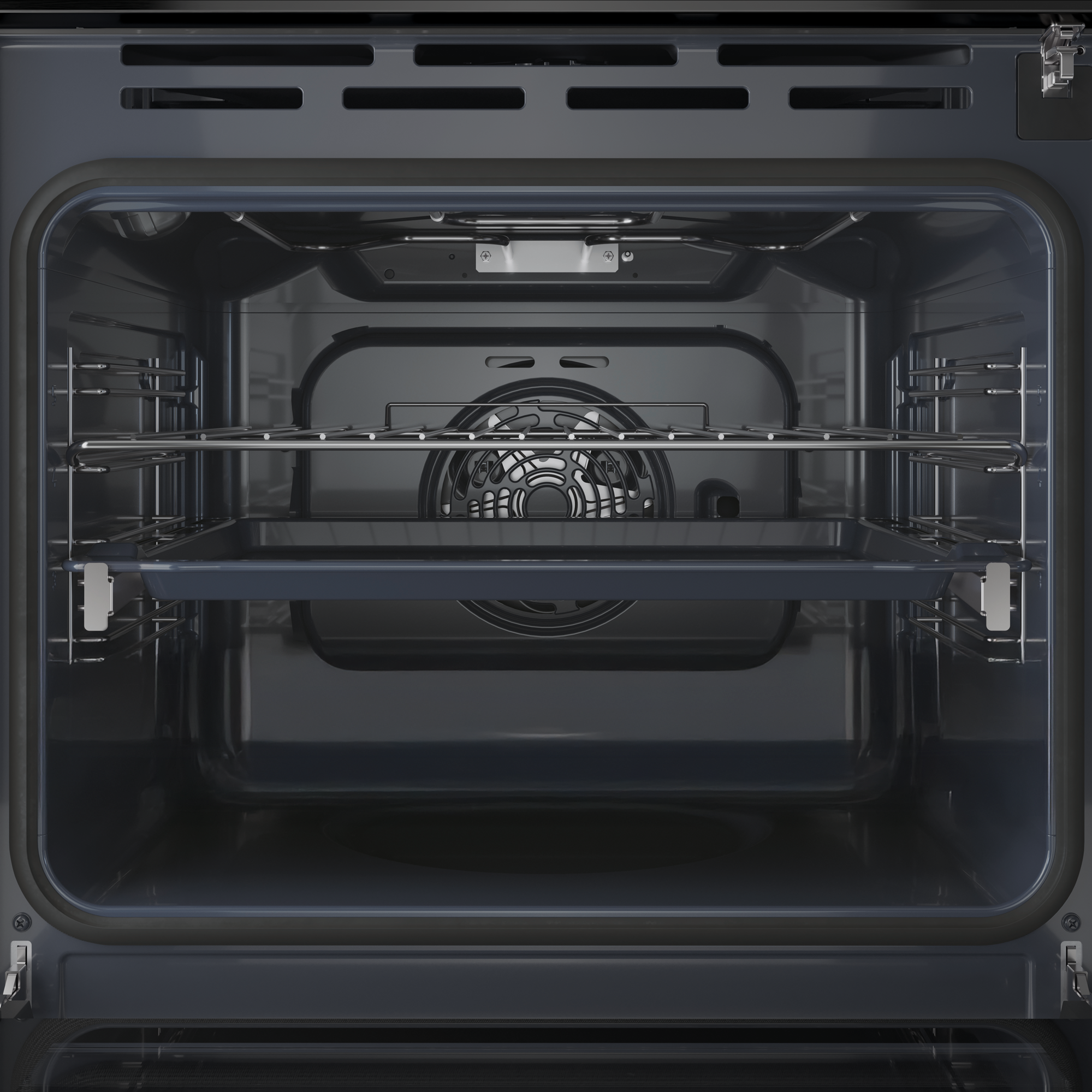 Wnętrze czystego, ciemnego piekarnika z rusztem i blachą.