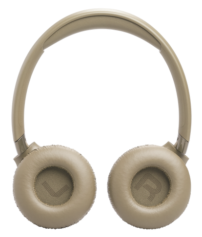Beżowe słuchawki z wyściełanymi nausznikami i pałąkiem. Wskaźniki L i R.