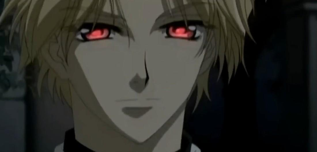 Ein Anime-Charakter mit blondem Haar und roten Augen blickt nachdenklich.