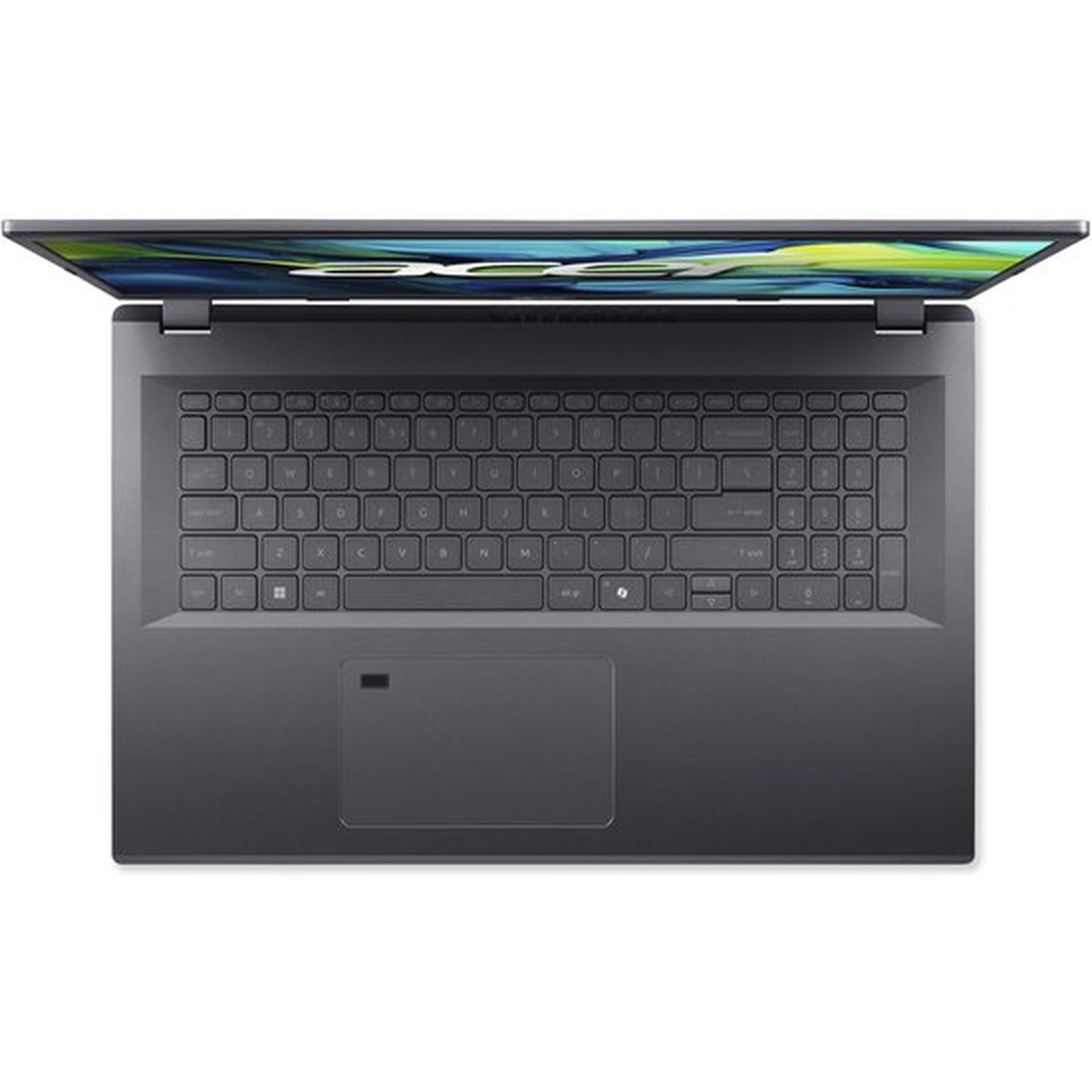 Un ordinateur portable ouvert et sombre, vue rapprochée du clavier.