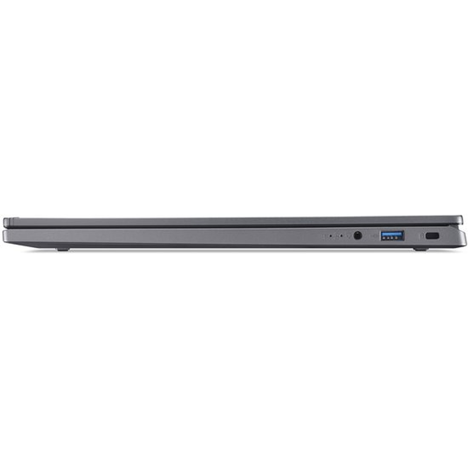 Vue latérale d'un ordinateur portable gris, montrant les ports USB et casque.