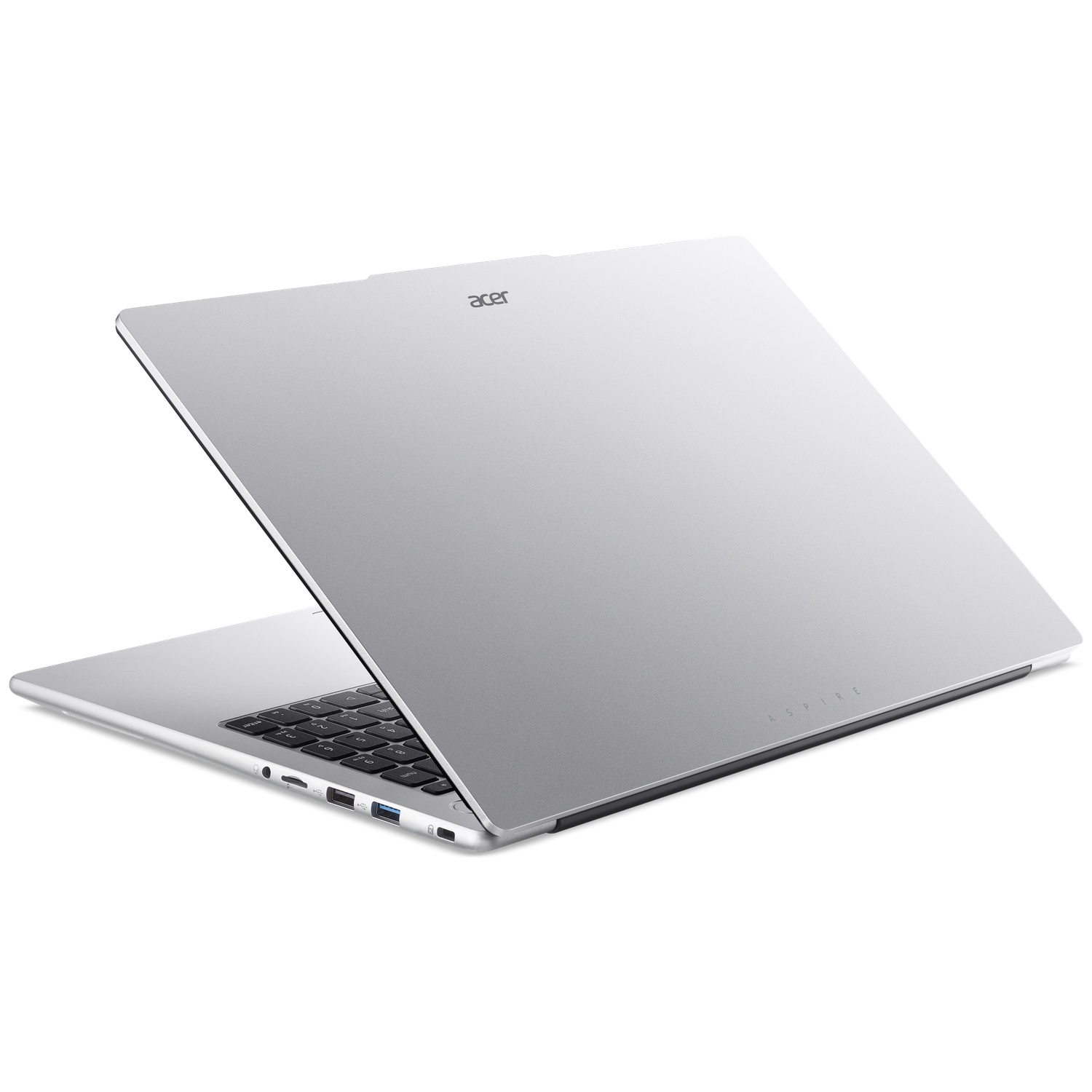 Un ordinateur portable Acer Aspire argent ouvert montrant clavier et ports.