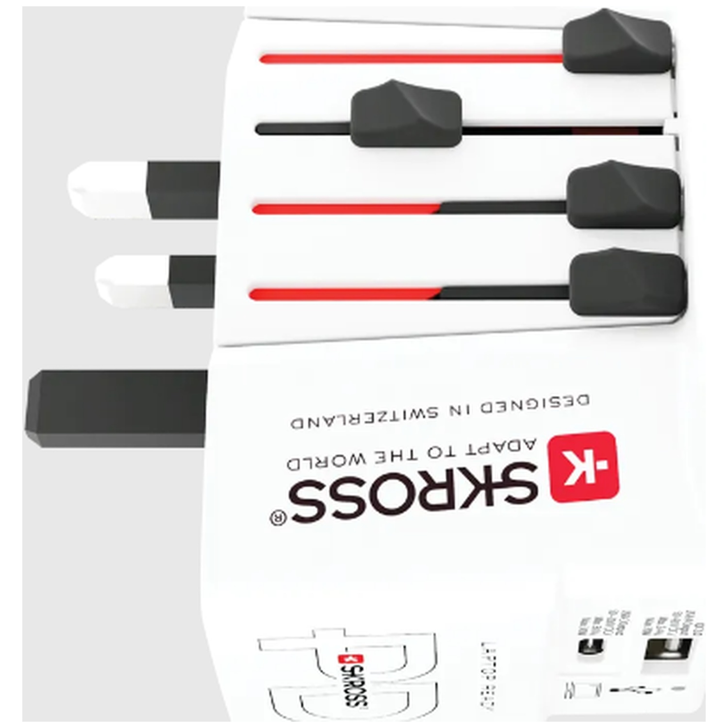 Un adaptateur de voyage blanc avec des broches rétractables et des accents rouges.