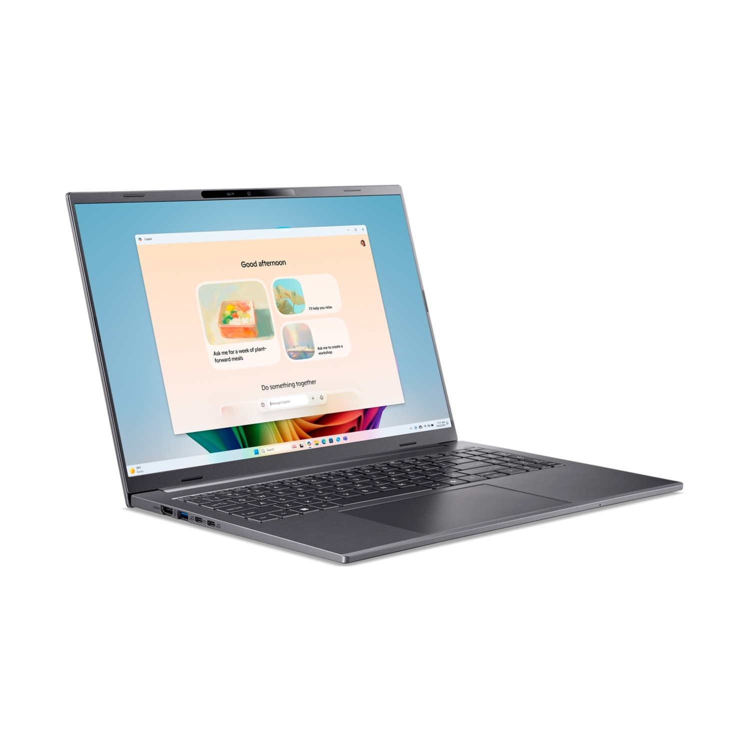 Un laptop aperto e scuro che mostra un'interfaccia Windows sul suo schermo.