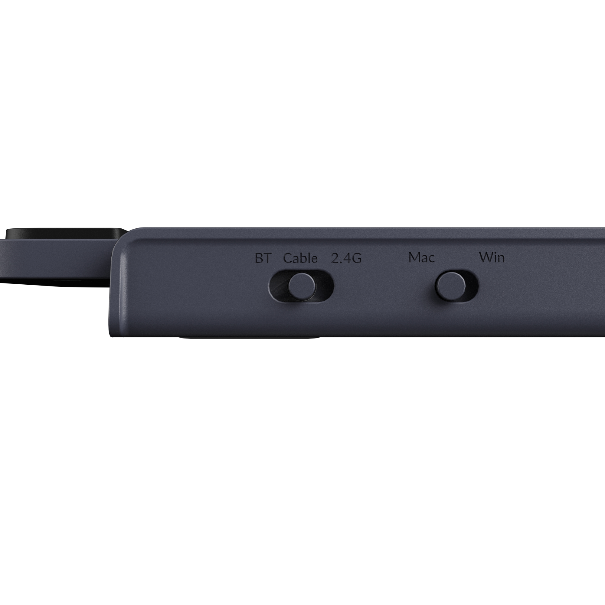 Graues elektronisches Gerät mit Schaltern für BT, Kabel, 2.4G, Mac, Win.