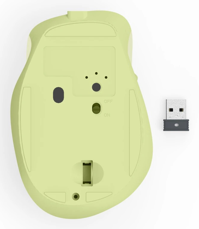 Die Unterseite einer hellgrünen Maus mit einem USB-Dongle daneben.