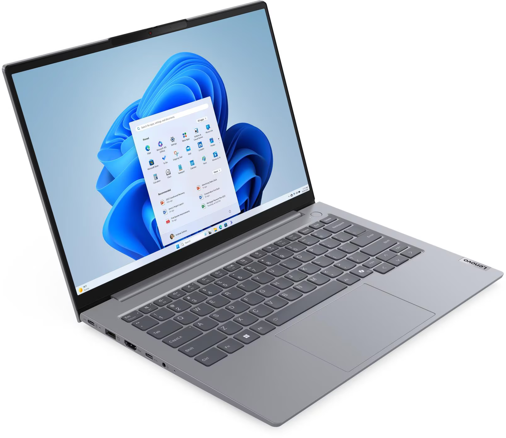 Egy szürke Lenovo laptop a Windows 11 Start menüjével a képernyőn.