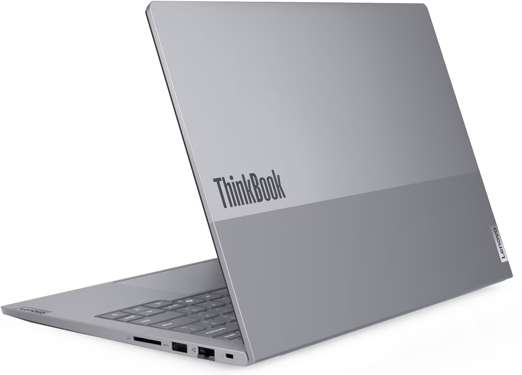 Ezüst laptop ThinkBook logóval, oldalról nézve.