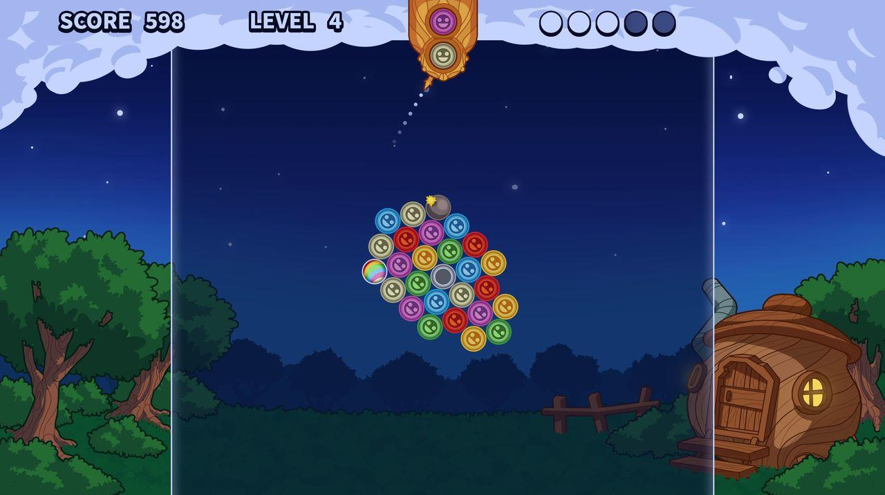 Spiel auf Nacht-Thema mit bunten Blasen und einem Baumhaus.