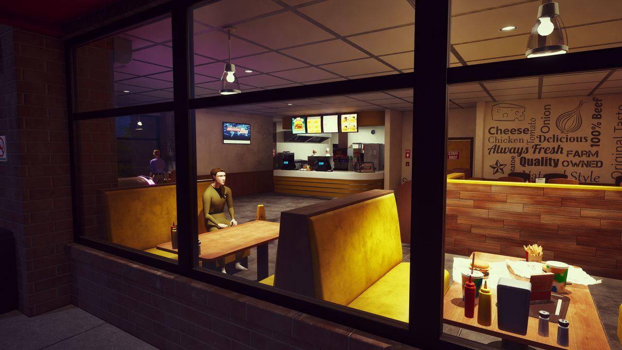 Ein Mann sitzt an einem Tisch in einem Fast-Food-Restaurant. Im Hintergrund ist die Theke.