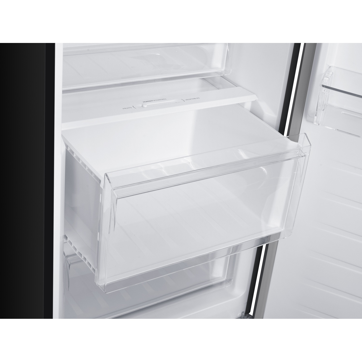 An empty refrigerator drawer area with a humidity control.