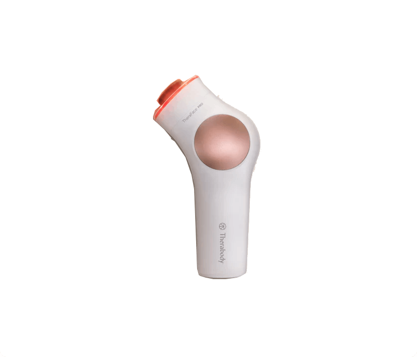 Un dispositivo de masaje blanco con elemento oro rosa y punta roja.